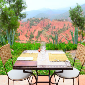 i-escape complementary wine_travel guide_travel_kasbah bab ourika_ourika valley_where to stay in morocco_best of morocco_africa_luxury experience_lunch_outdoor_red mountains_nature copy