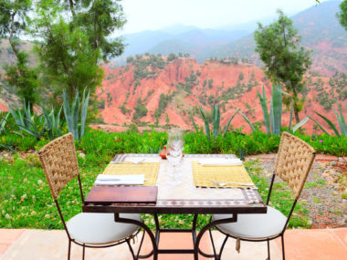 i-escape complementary wine_travel guide_travel_kasbah bab ourika_ourika valley_where to stay in morocco_best of morocco_africa_luxury experience_lunch_outdoor_red mountains_nature copy
