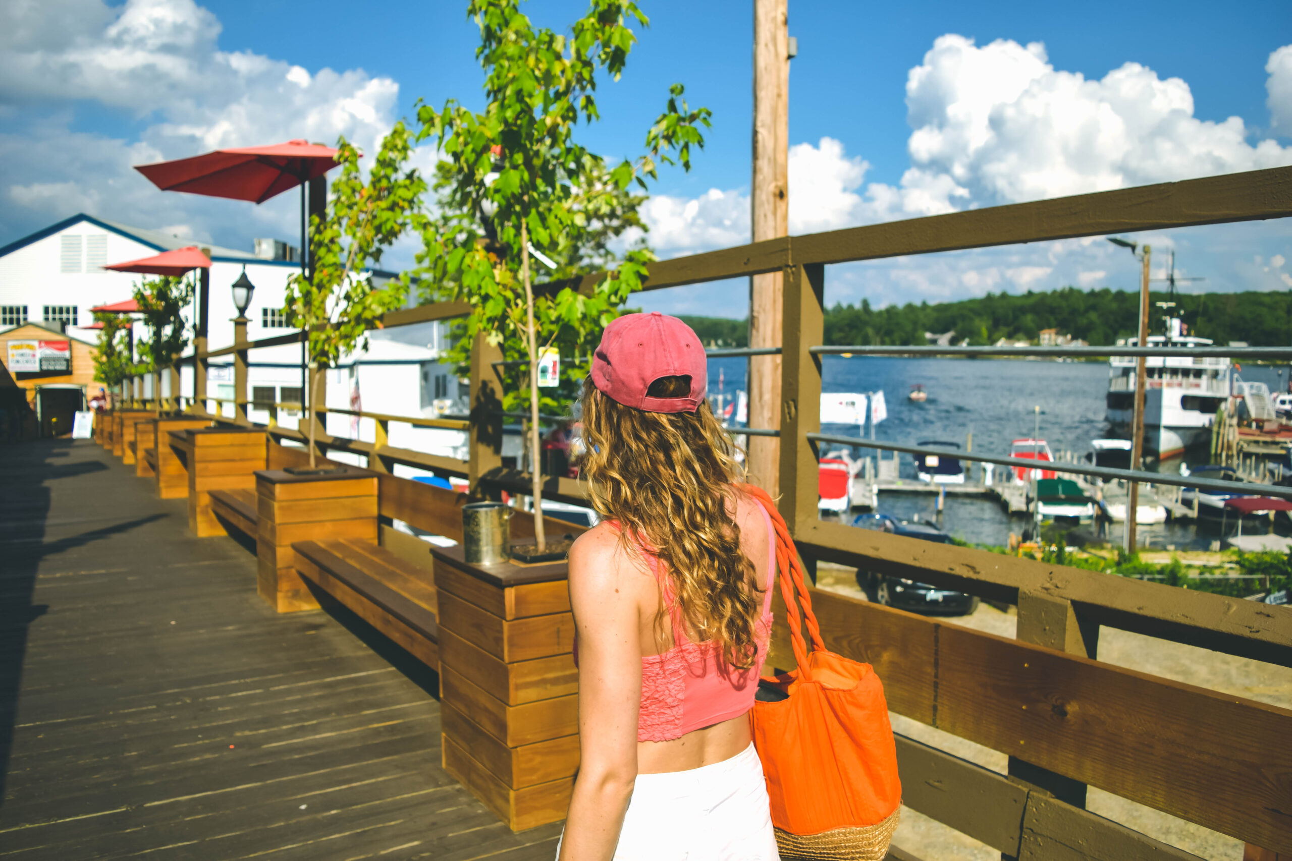 Lake Winnipesaukee_New Hampshire_Travel Guide_What to do_What to See_ice cream_jb scoops_vanilla sugar cone with chocolate sprinkles_summer treats_fashion_winnipesaukee pier_walk_photography_dock