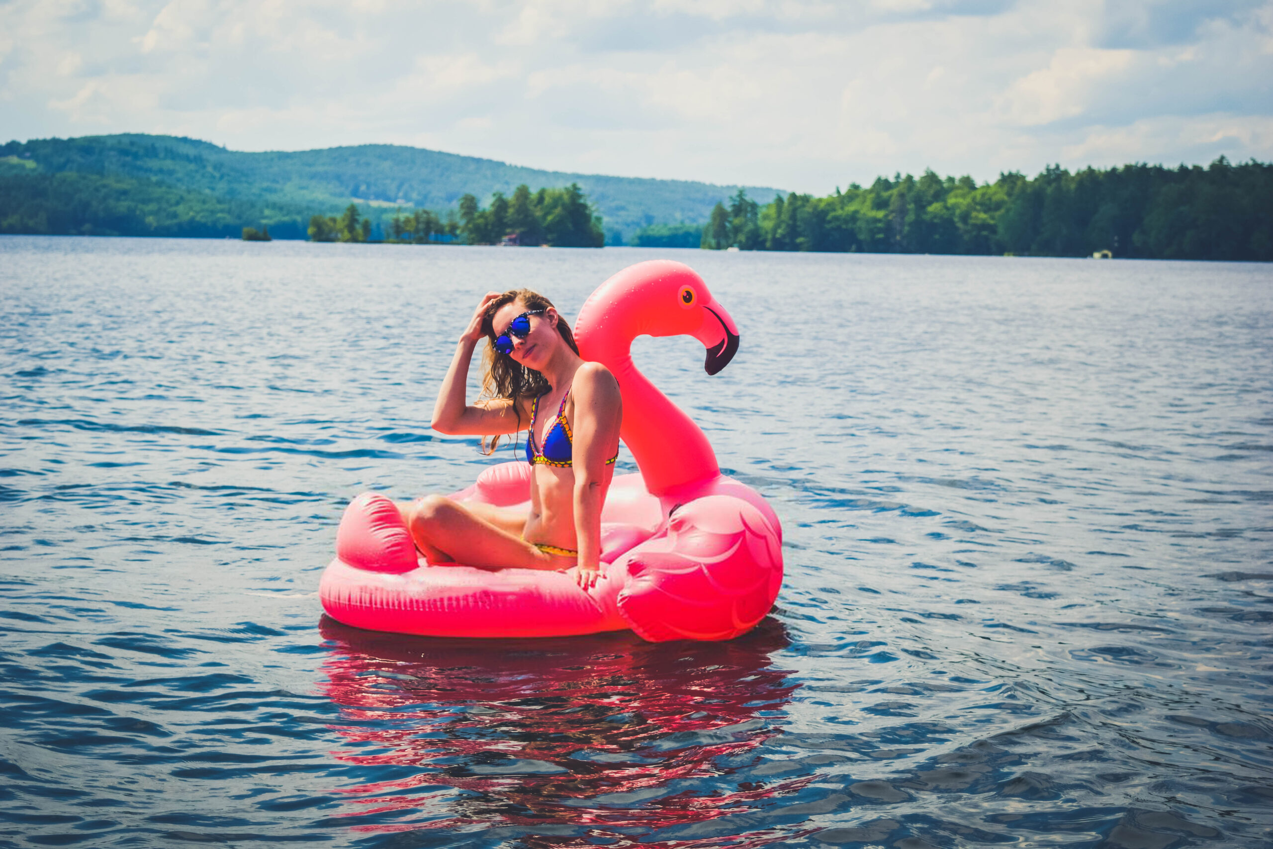 Lake Winnipesaukee_New Hampshire_Travel Guide_What to do_What to See_kiini_bikini_fit_girl_photography_fashion blogger_travel blogger_flamingo float_summer accessory_hair_water
