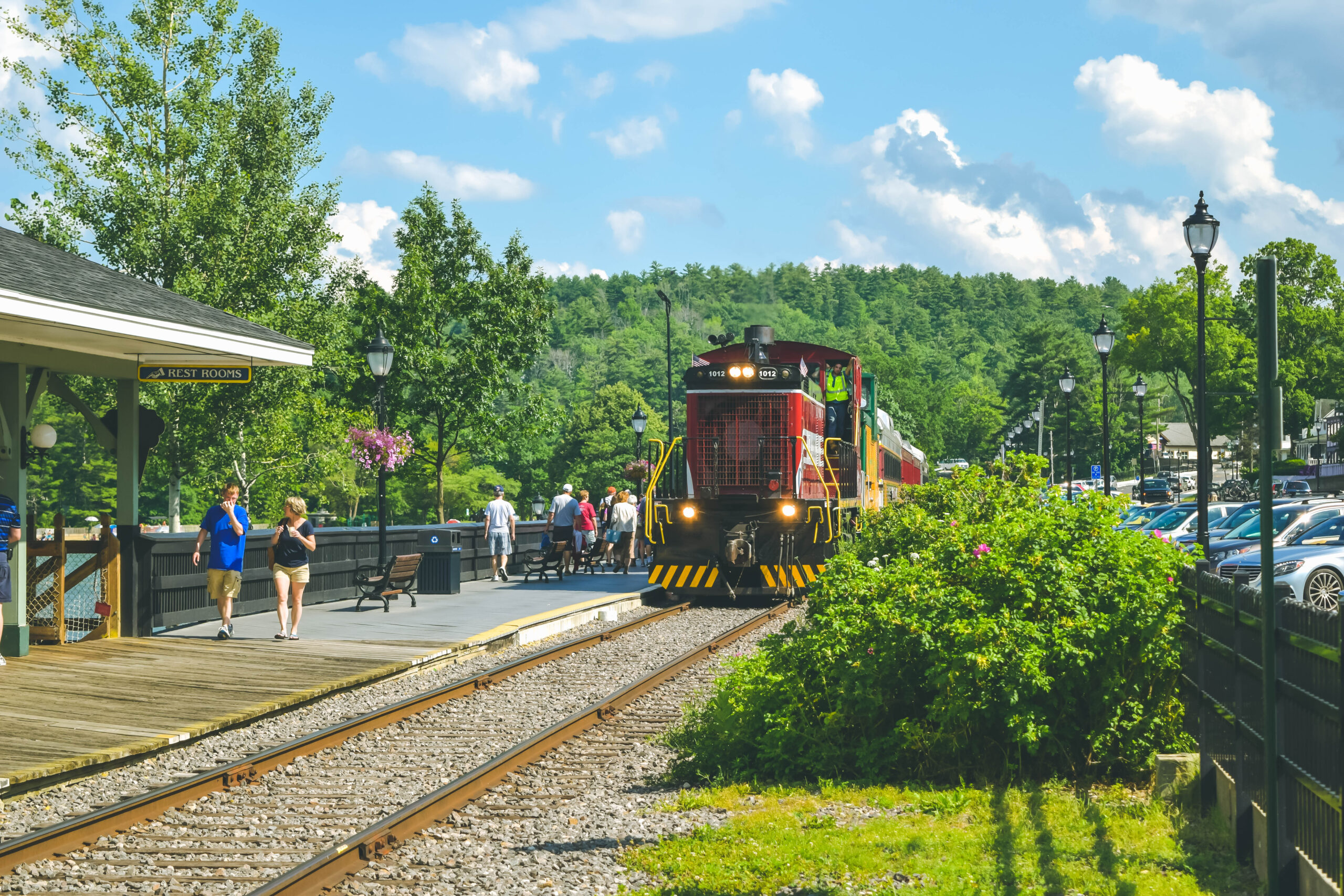 Lake Winnipesaukee_New Hampshire_Travel Guide_What to do_What to See_train tracks_meredith_weirs beach_train ride_tracks_dock_winnipesauke pier_adventure_vintage_old_1900s_movie