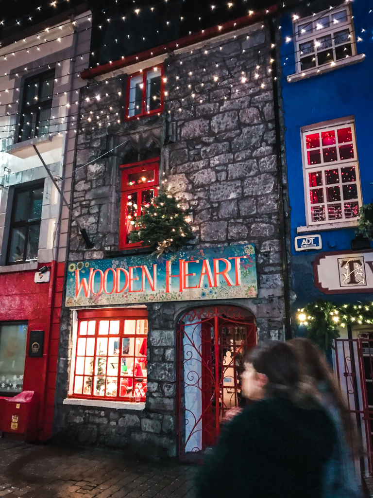 9 Things to Do in Galway, Ireland during Christmas quay street the quay twice as nice wooden heart galway travel guide