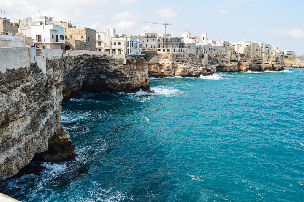 Essential Travel Guide to Polignano a Mare, Italy puglia svadore punto panoramico largo ardito lungomare cristoforo colombo vista viewpoint
