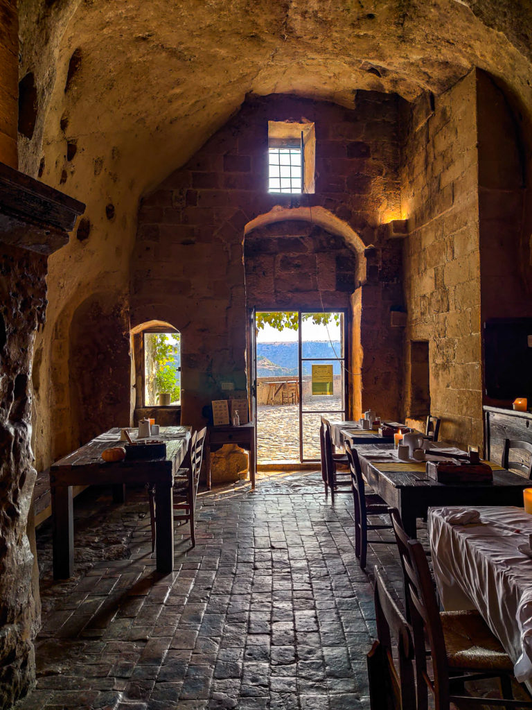 Sleep in Cave Hotel Sextianto Le Grotte della Civita in Matera, Basilicata travel guide where to stay travel blog svadore puglia road trip rock hewn church breakfast hotel sassi civita