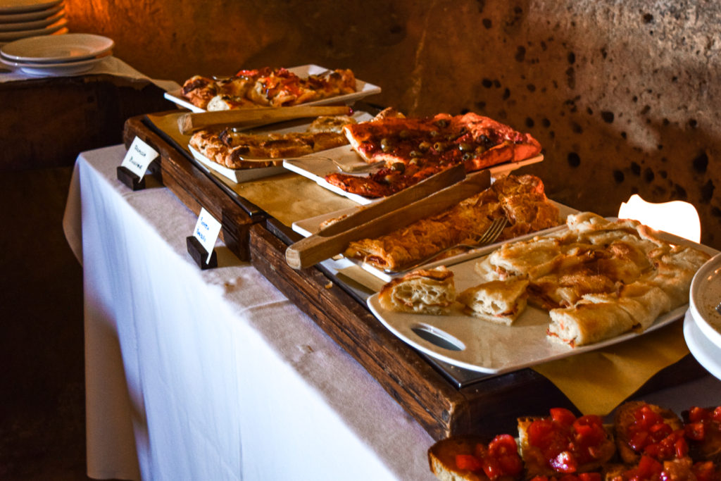 Sleep in Cave Hotel Sextianto Le Grotte della Civita in Matera, Basilicata travel guide where to stay travel blog svadore puglia road trip rock hewn church breakfast hotel sassi civita