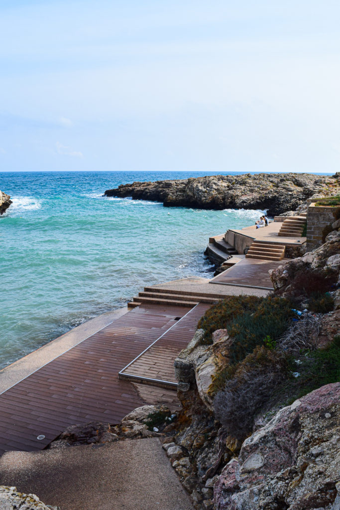 Essential Travel Guide to Polignano a Mare, Italy puglia svadore lido cala paura beach spiaggia