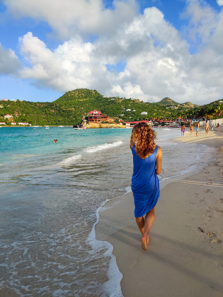 Beachfront dining at Nao St. Barth on St. Jean beach with views of planes taking off from the airport.