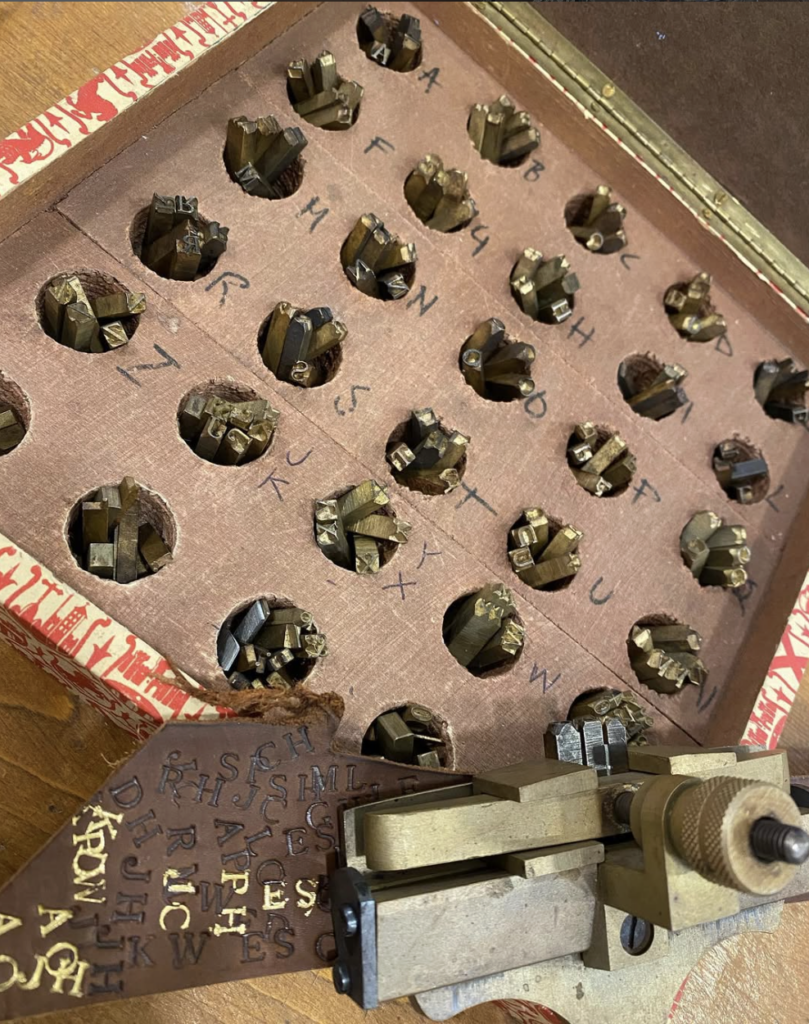 Authentic leather artisan workshops in Florence: Hand-tooling 22-karat gold leaf onto goatskin at Il Torchio.