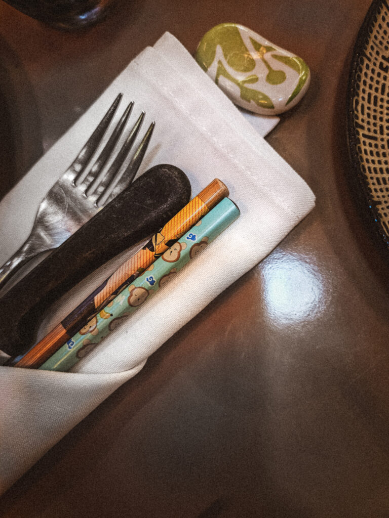 Eclectic mix-and-match chopsticks at an authentic restaurant in Corossol